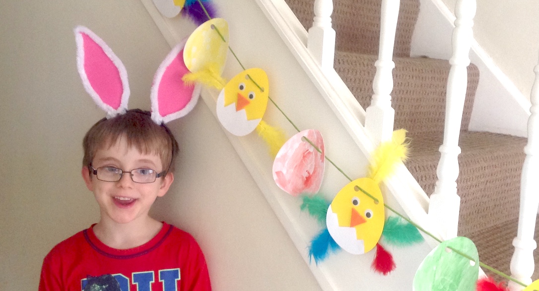 Toni Steven’s son showing off his Easter toucanBox crafts